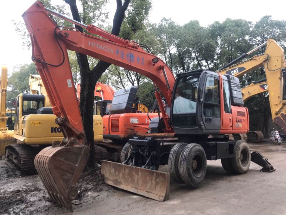 上海35万元出售原装日立日立130轮挖轮式挖掘机